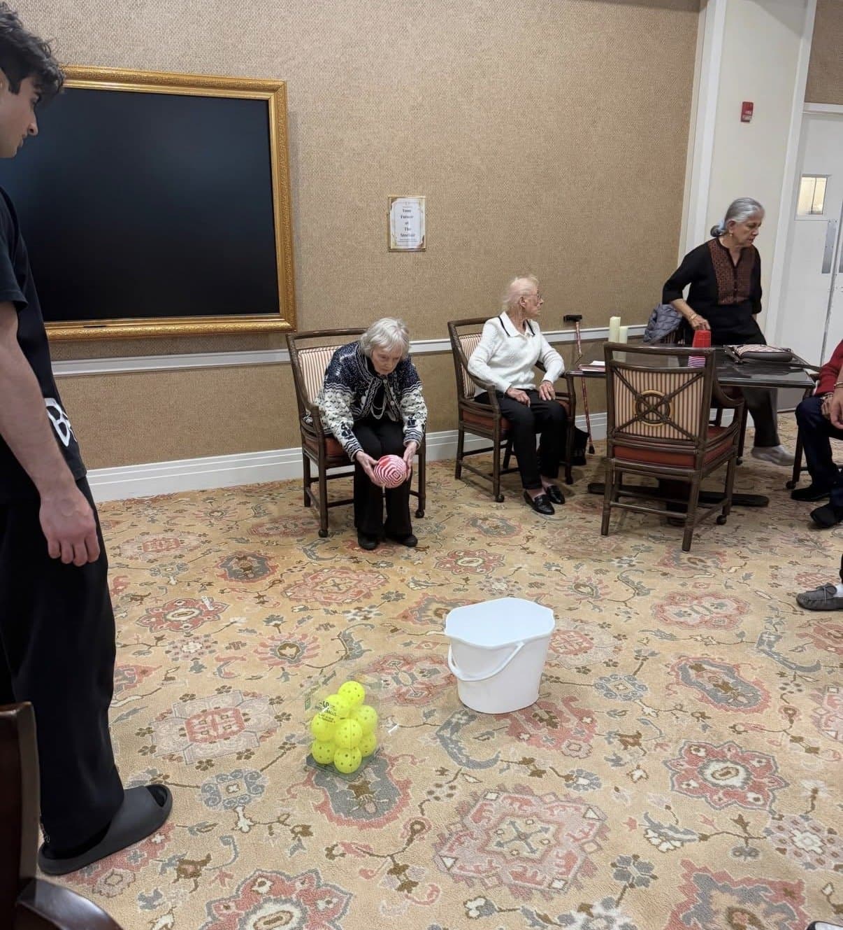A resident lining up a ball toss