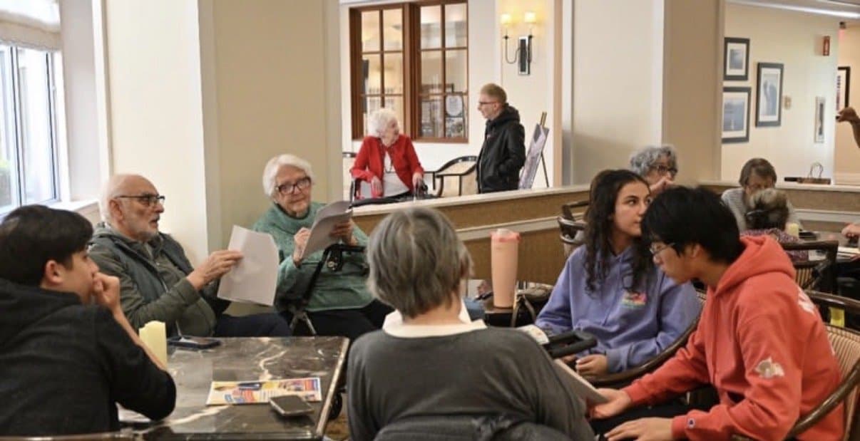 Volunteers and residents talking together